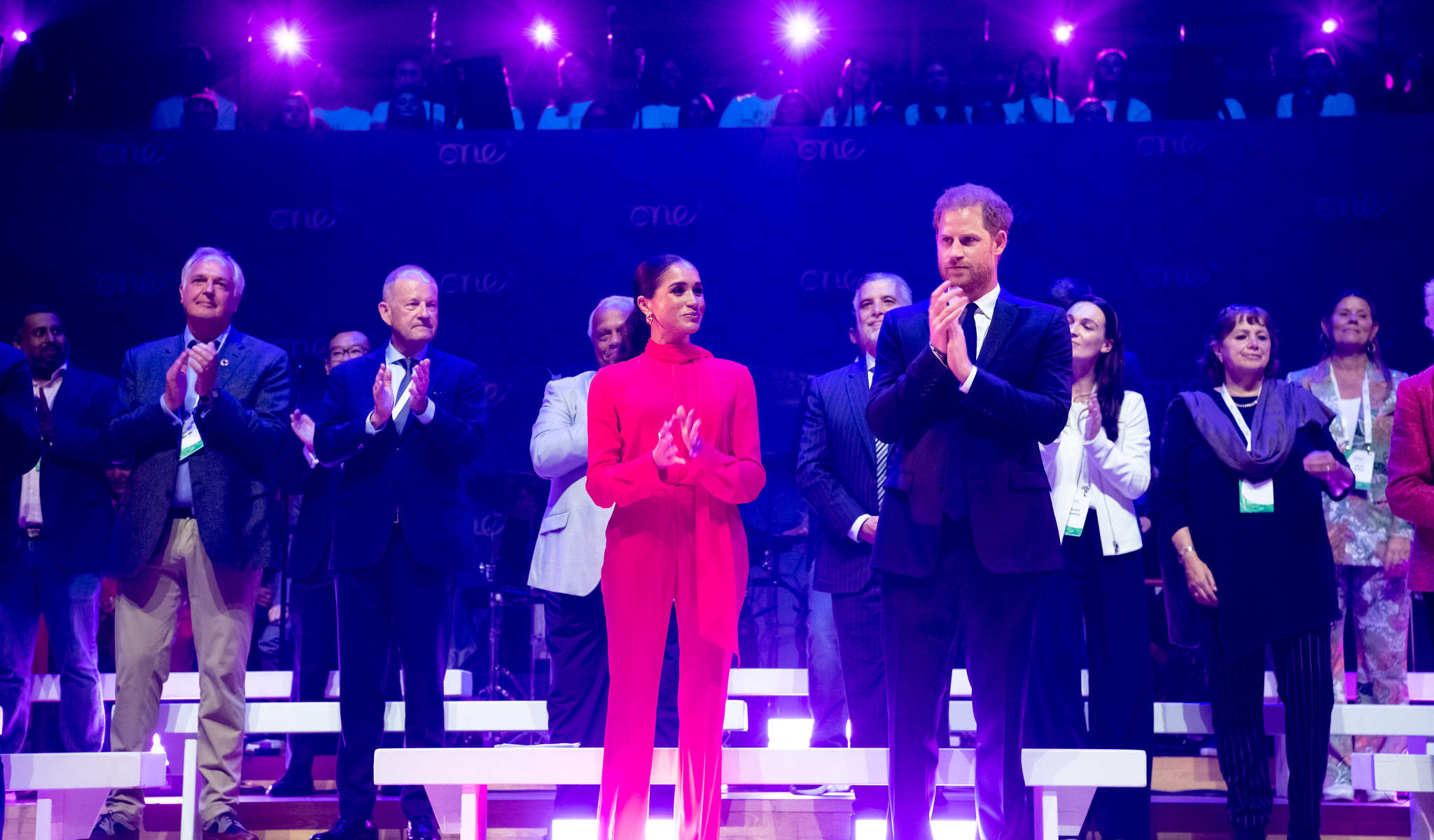 OYW 2022 Manchester Summit Opening Ceremony with Counsellors on stage applauding delegates